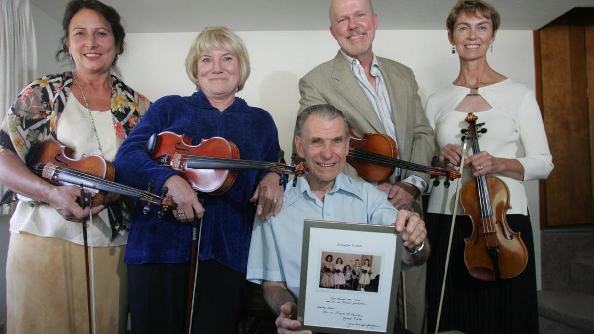 Victor Sands, seated, died on Dec. 27 at age 88. He was a longtime Kennewick musician and music teacher. In 2006, four of his former students reunited to play for him in a touching tribute.