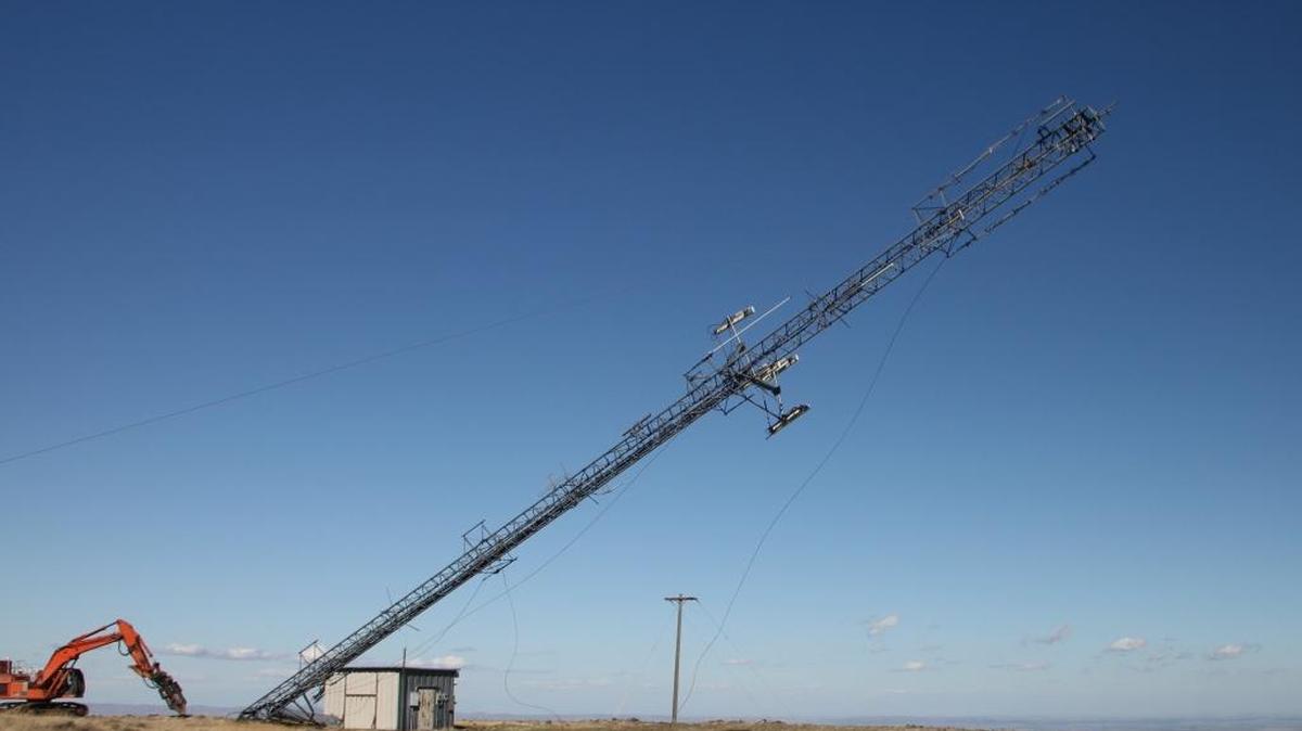 A 165-foot cellphone communications tower is removed by CH2M Hill Plateau Remediation Co. workers from Rattlesnake Mountain in the Hanford Reach National Monument in this 2010 file photo. Most of the structures on the mountain were removed since CH2M Hill began a $10.2 million recovery act project to clear the monument of buildings and debris.