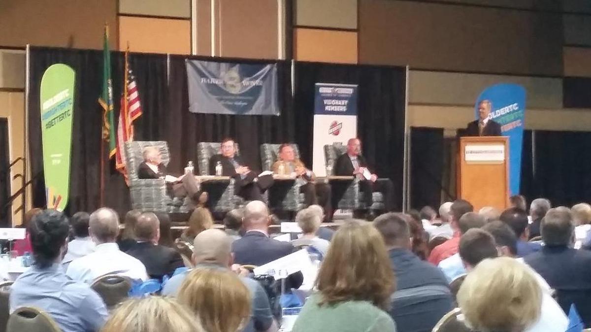 Jim Hall, right, of Kadlec Regional Medical Center, moderates the annual State of the Cities program featuring the four Tri-City mayors. From left, they are Kennewick’s Steve Young, Pasco’s Matt Watkins, Richland’s Bob Thompson and West Richland’s Brent Gerry.
