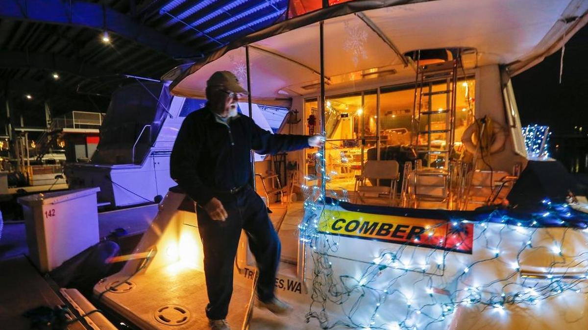 Mike Lauman of Pasco puts the finishing touches on his boat before he participates in the Christmas Lighted Boat Parade starting at 6 p.m. Friday and Saturday from Clover Island in Kennewick. Lauman has participated for 15 years. About 20 boats take 2 to 2 1/2 hours to travel along the Columbia Park shoreline, past Columbia Point to Howard Amon Park in Richland, and then return to Clover Island.