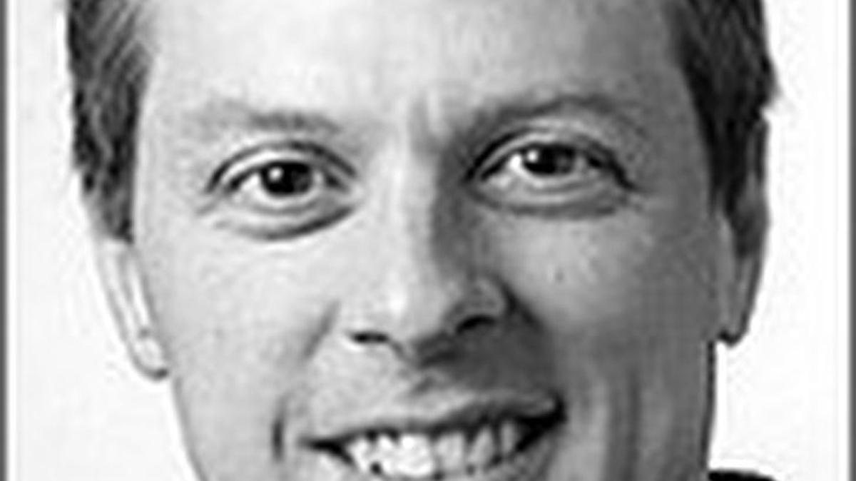 Tom Karier