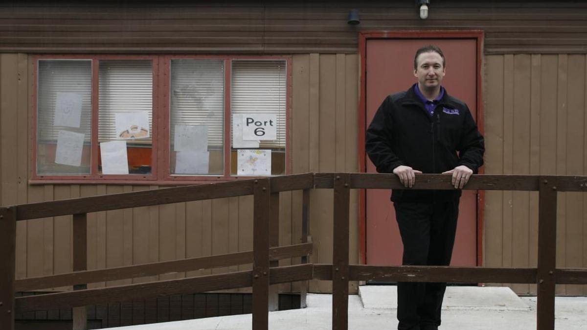 North Franklin School District Superintendent Gregg Taylor stands in front of one of Connell Elementary’s portables in 2009.