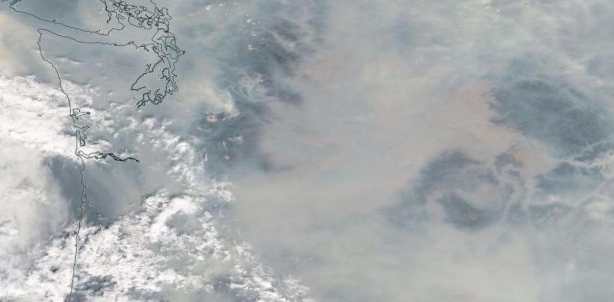 An image from NASA shows heavy smoke blanketing the Pacific Northwest on Sept. 6.