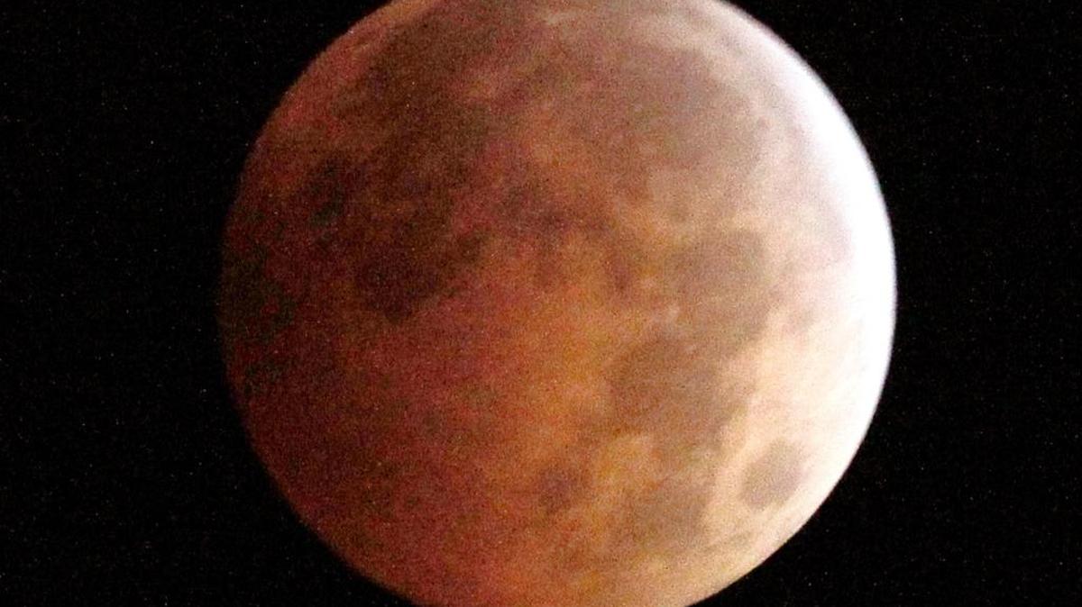 
This October 2014 photo shows the Blood Moon, created by the full moon passing into the shadow of the Earth during a total lunar eclipse. 
