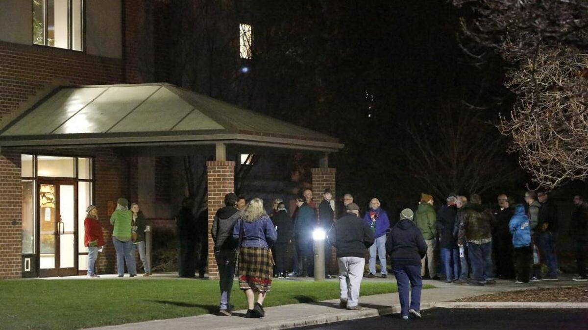 A crowd for Monday night’s Pasco City Council meeting begins gathering early at the east parking lot entrance to city hall. Supporters from both sides were expected to turn out to express their opinions for the religious freedom resolution proposed by Councilman Bob Hoffmann.