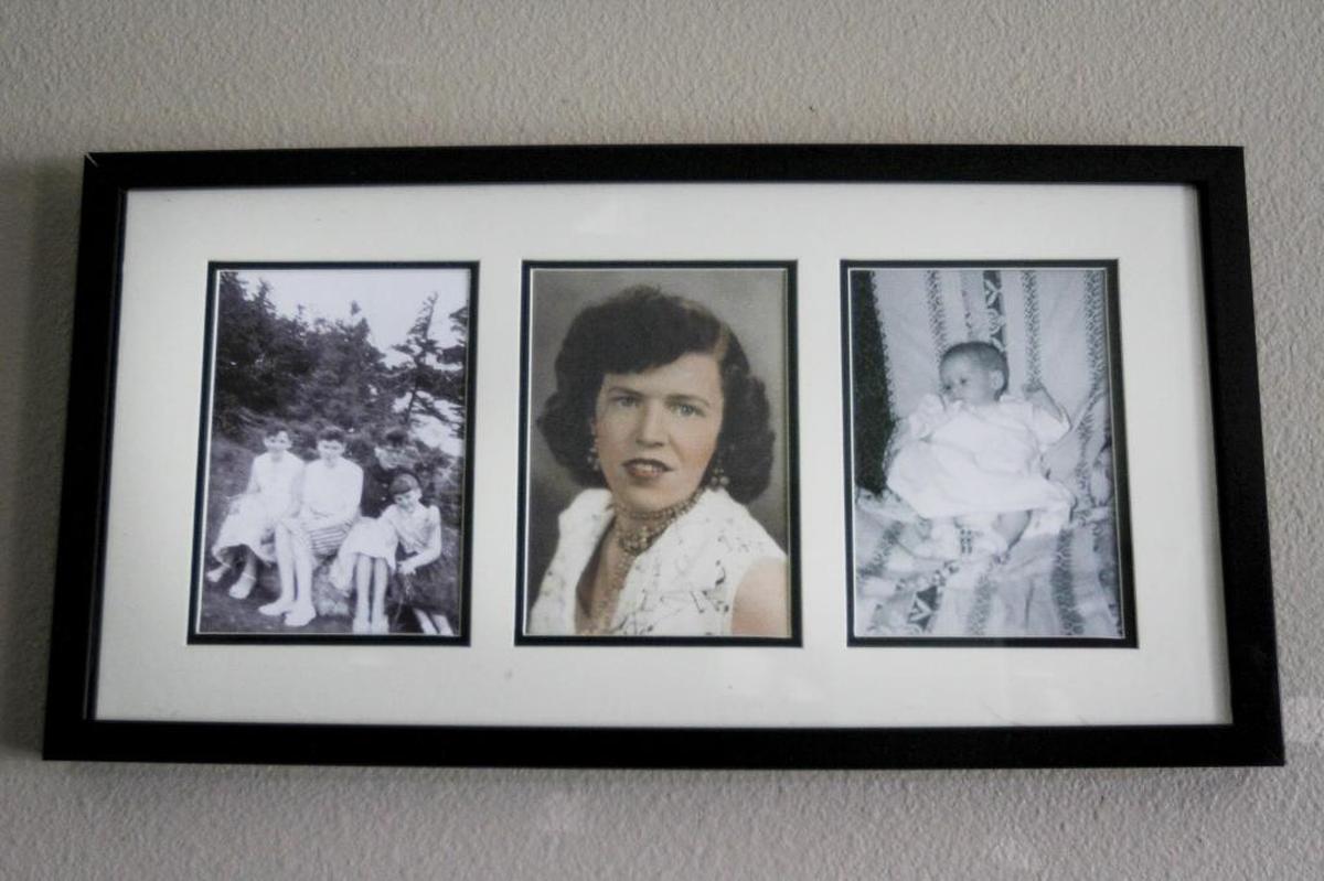 Framed photos of Jan Seely’s family. The center photo is Ida Murphy, Seely’s birth mother.