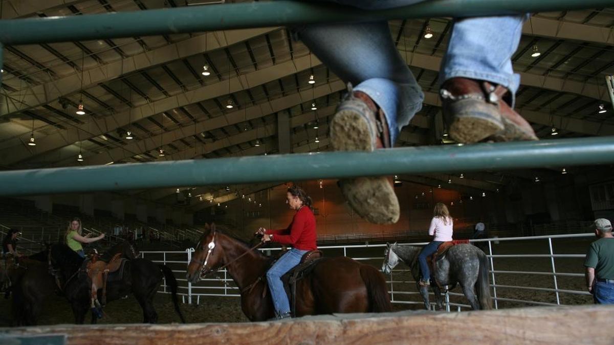 Franklin County commissioners rejected a proposal to pave the TRAC arena Wednesday. Organizers of events such as the Barrel Racers National 4-D finals told commissioners they would leave TRAC rather than jeopardize rider and animal health on a dirt-covered concrete competition surface.