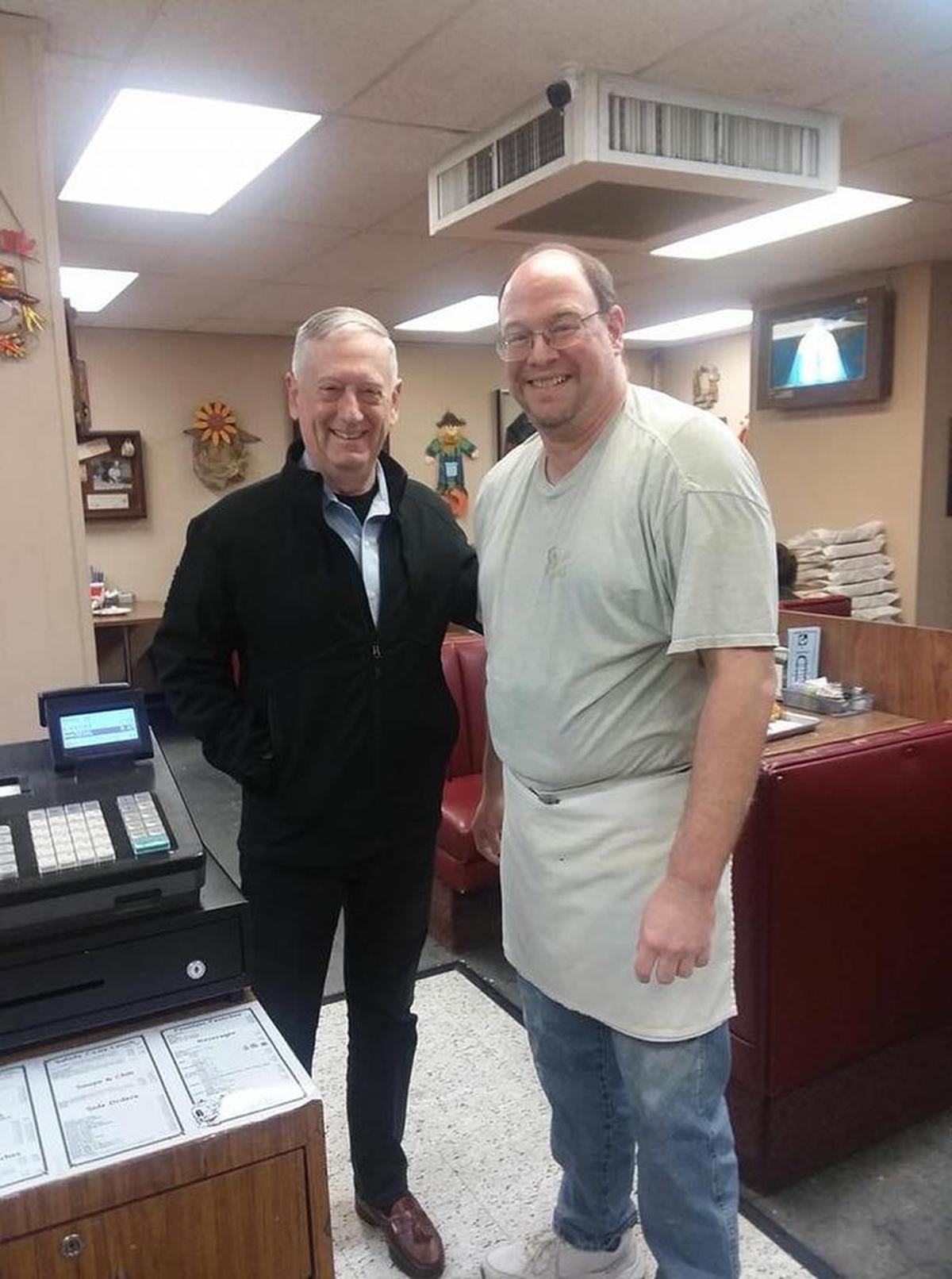 Spudnut Shop employee Kevin Russell, right, got a photo with Secretary of Defense James Mattis during a Thanksgiving holiday.