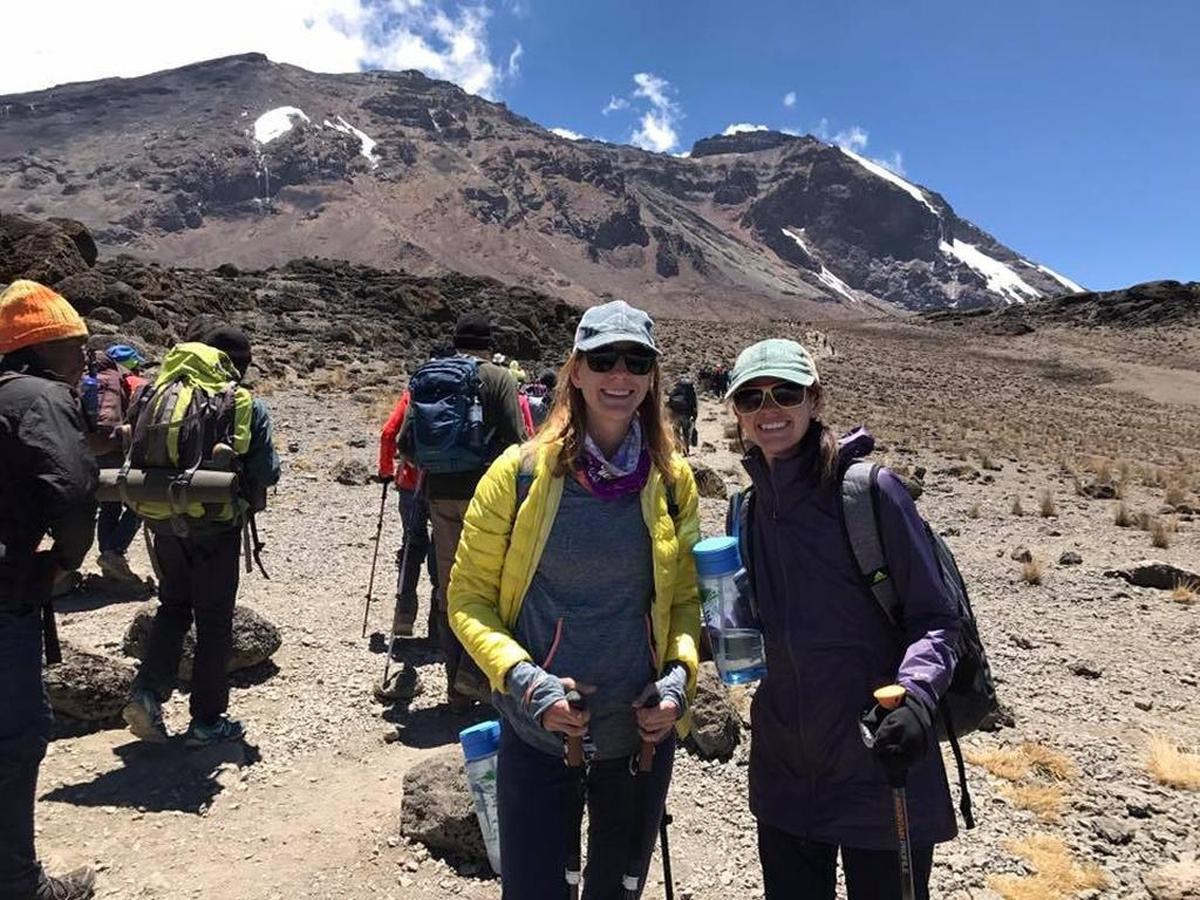 EarthFix/Northwest Public Radio reporter Courtney Flatt, left, and Tri-City Herald reporter Sara Schilling climbed Mount Kilimanjaro with a group of friends in October, reaching the summit on the morning of Oct. 9. The climb took six days. Here they are along the way.