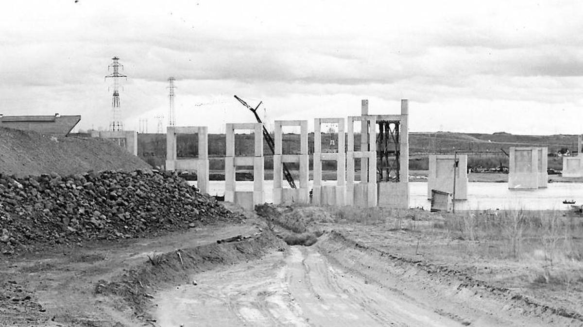 Piers for a high bridge over the Columbia River at Plymouth are nearing completion. Erection of the super-structure is scheduled to begin soon. The bridge, which will replace ferries now operating at Plymouth, is to be opened later this year. This photo published April 8, 1954.