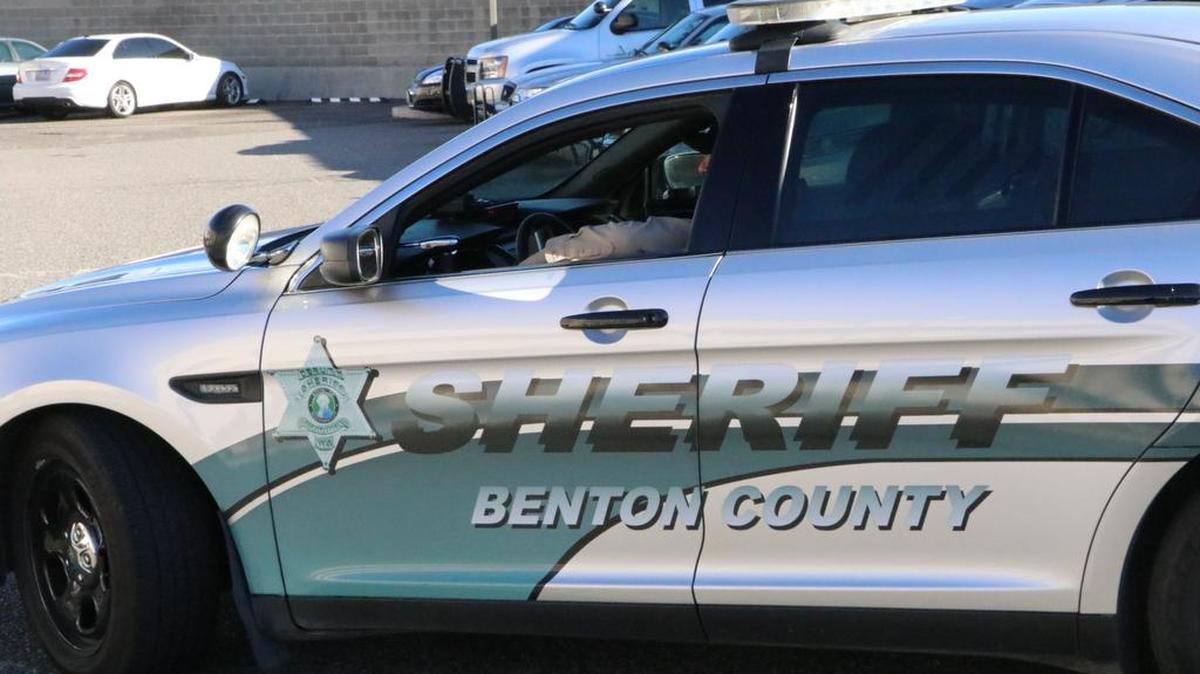 A Benton County Sheriff’s Office patrol car leaves the parking area to go on patrol.