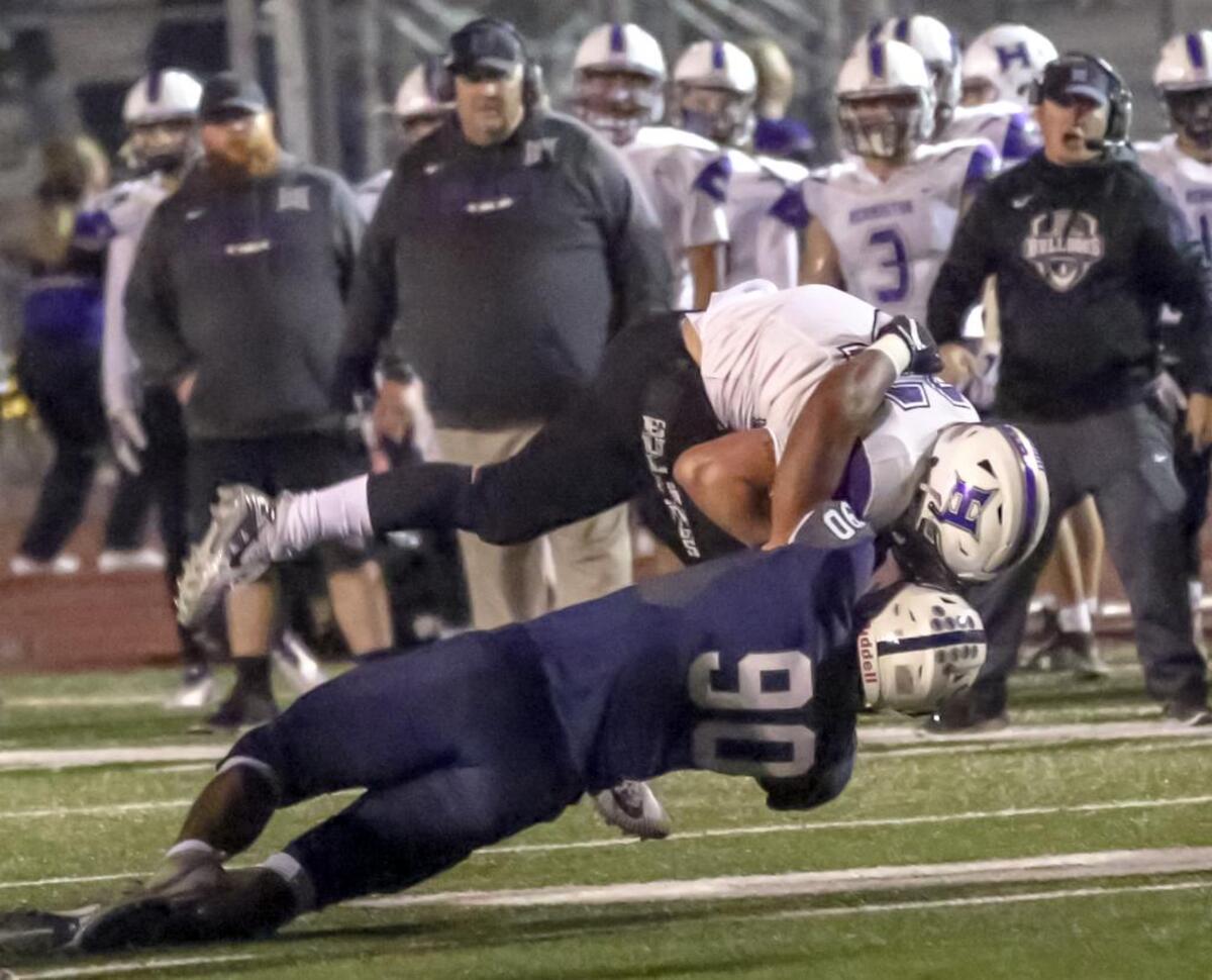 Chiawana High School standout linebacker AJ Vongphachanh (90) has agreed to play for Utah State in the fall.