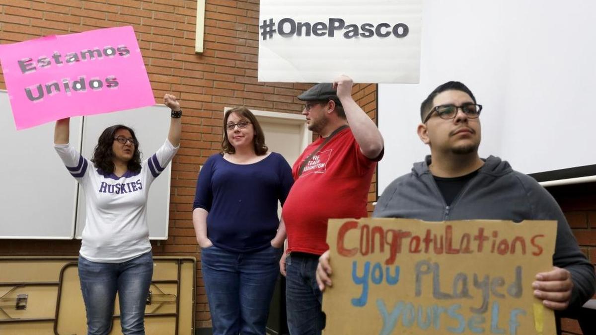 Pasco residents picket a Kennewick City Council meeting in April in reaction to Councilman Bob Parks’ private Facebook postings disparaging Pasco, Yakima and Latinos.