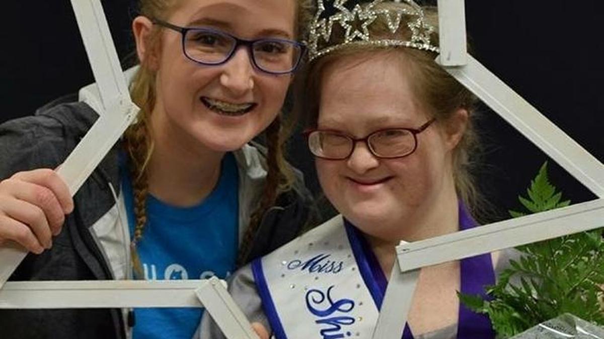 Sarah Hamson, 24, of Kennewick, right, was crowned queen in the women’s division during the Washington Shining Star Pageant.
