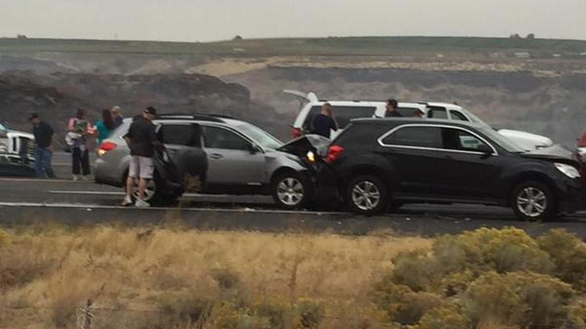 
Vehicles involved in crashes on Interstate 82 near Benton City remain in place on the roadway. Authorities closed the highway between Benton City and Prosser mid-Saturday afternoon because of the crashes and a grass fire in the area.
