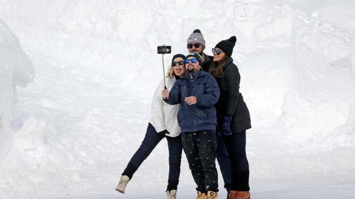 Visitors pose for a selfie in Mount Rainier National Park in Washington state. Admission to the park is free on Martin Luther King Jr. Day.