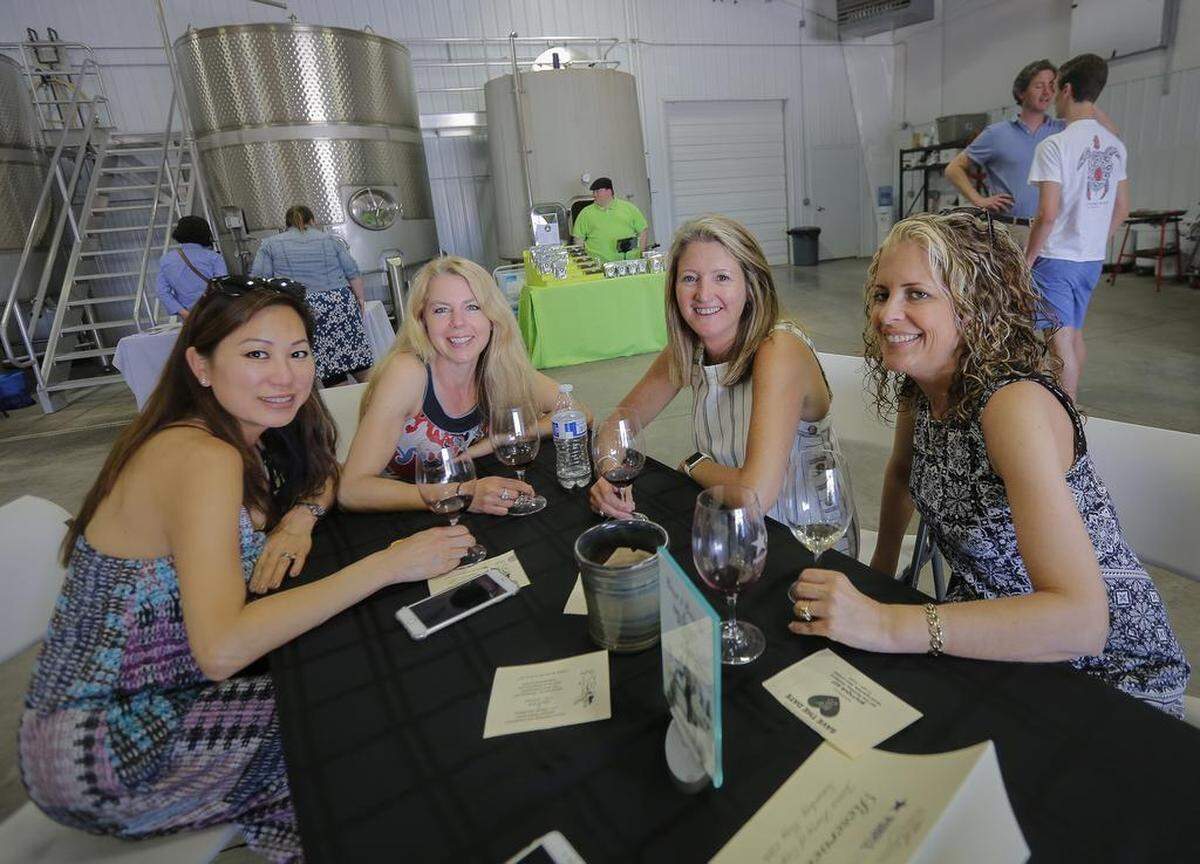 May 13, 2018 - Friends Emmy Park, left, Janice Griner, Eileen Gwinn, center, and Mary Parks at Purple Star Winery in Benton City.