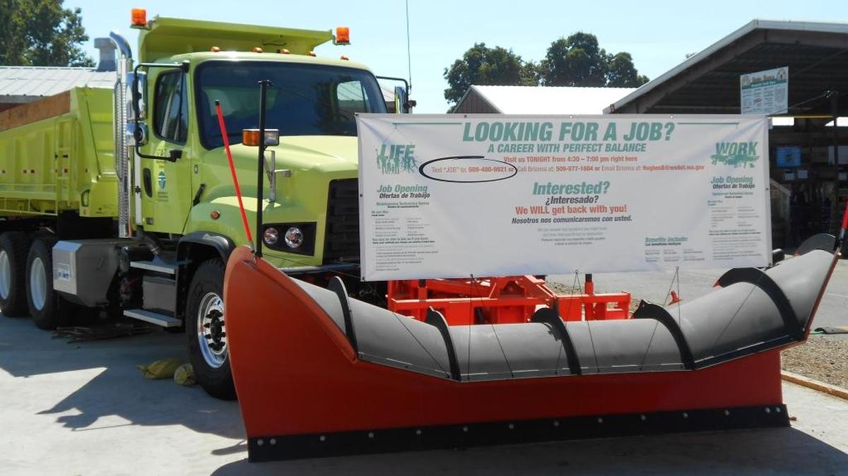 The Washington Department of Transportation advertised jobs on the front of a snowplow during the Benton-Franklin Fair in August. The Tri-City unemployment rate is at a record low of 4.6 percent, according to figures released Tuesday by the state Employment Security department.