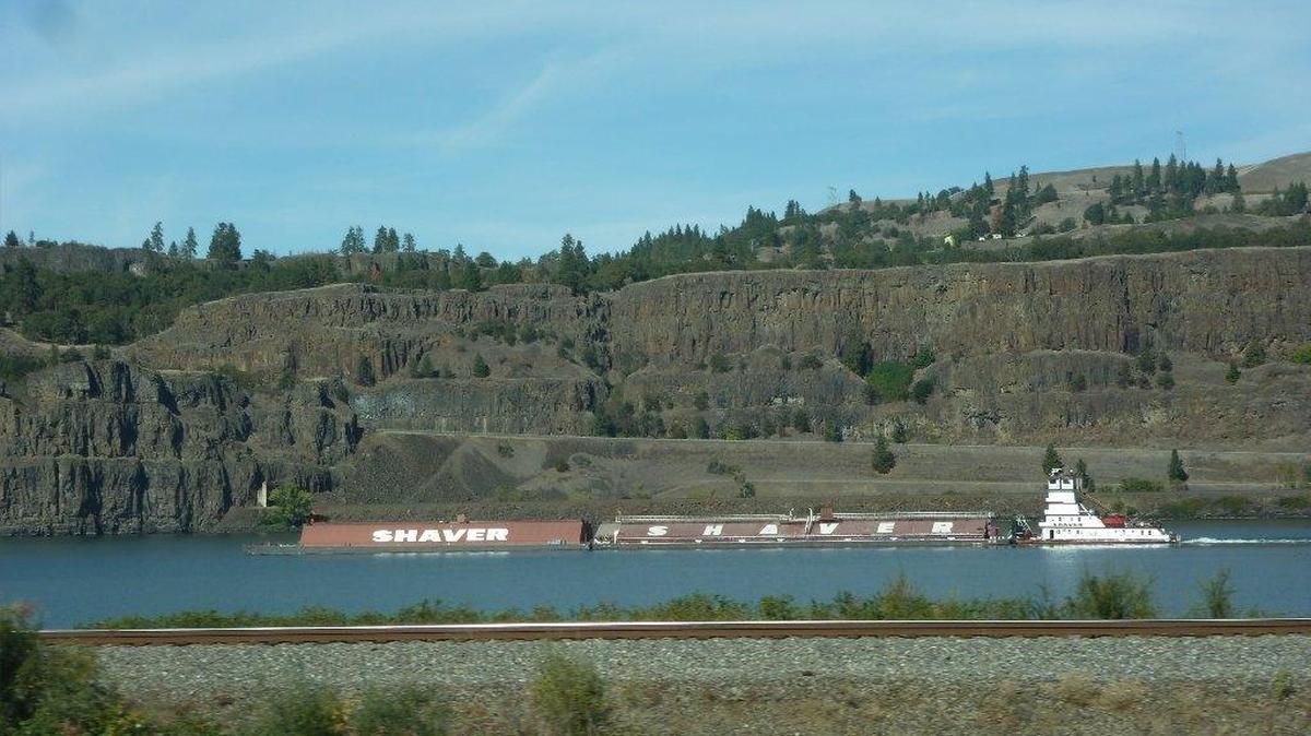 A barge travels the Columbia River between Hood River and The Dalles.