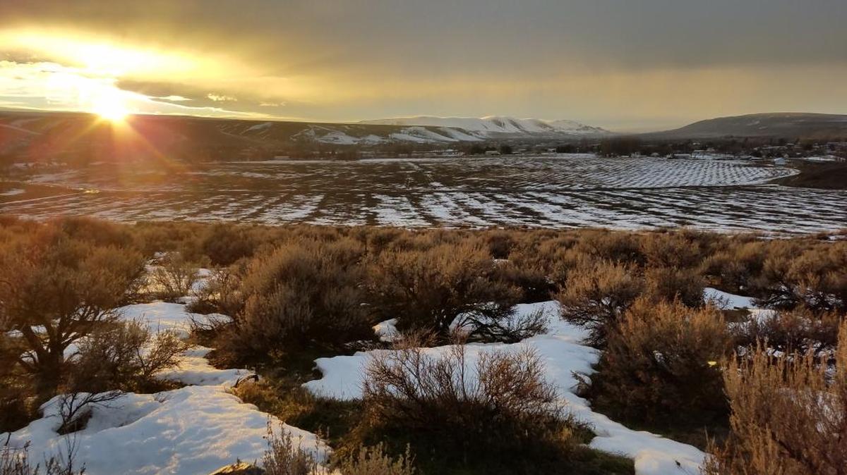 Reader John Panther of Kennewick took this photo of a sunset this week through the rain in Badger Canyon. The forecast calls for rain on Saturday in the Tri-Cities, with high temperatures near 42, said the National Weather Service. There’s a 70 percent chance of precipitation but less than a tenth of an inch is possible. Overnight lows are expected near 31. Sunday also will be cloudy with a chance of rain, with winds increasing to as high as 18 mph.