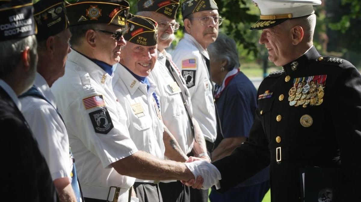 Gen. James Mattis, then commander of the U.S. Central Command, greets veterans in 2012 prior to the Time of Remembrance ceremony at Flat Top Park in West Richland. The event honored men and women who have died fighting the war on terrorism in Iraq and Afghanistan.