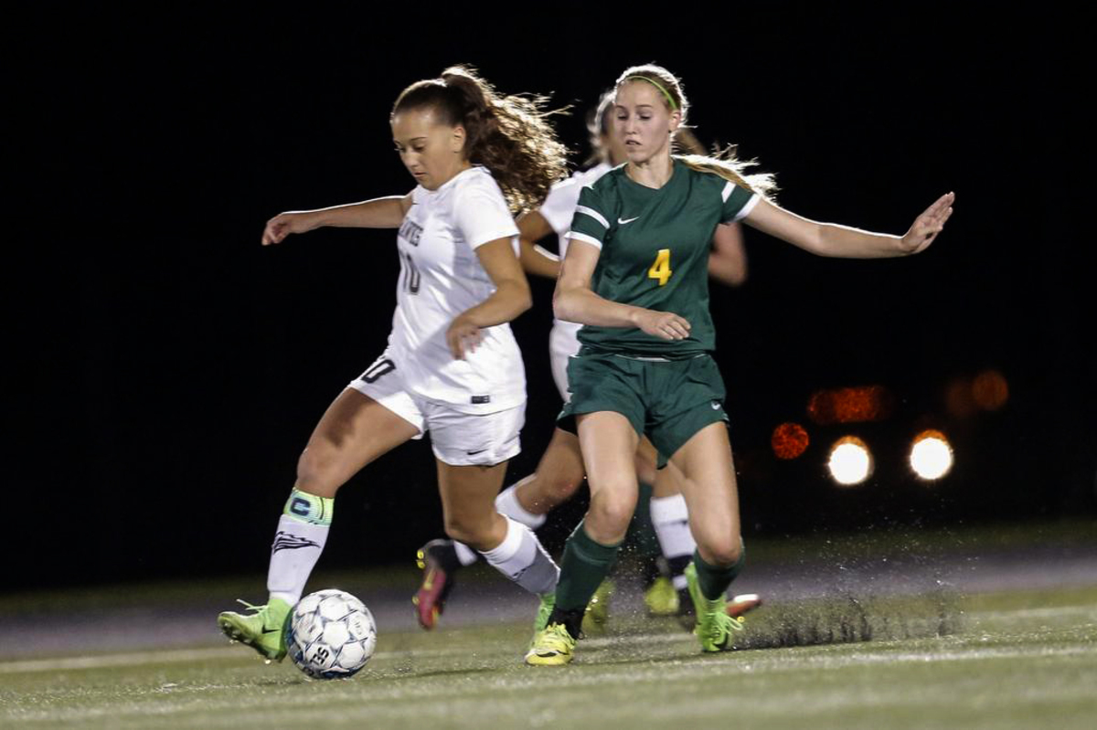 File photo -- Summer Yates (10), dribbles the ball for Chiawana High in Pasco around a Richland defender during a 2017 MCC soccer match.