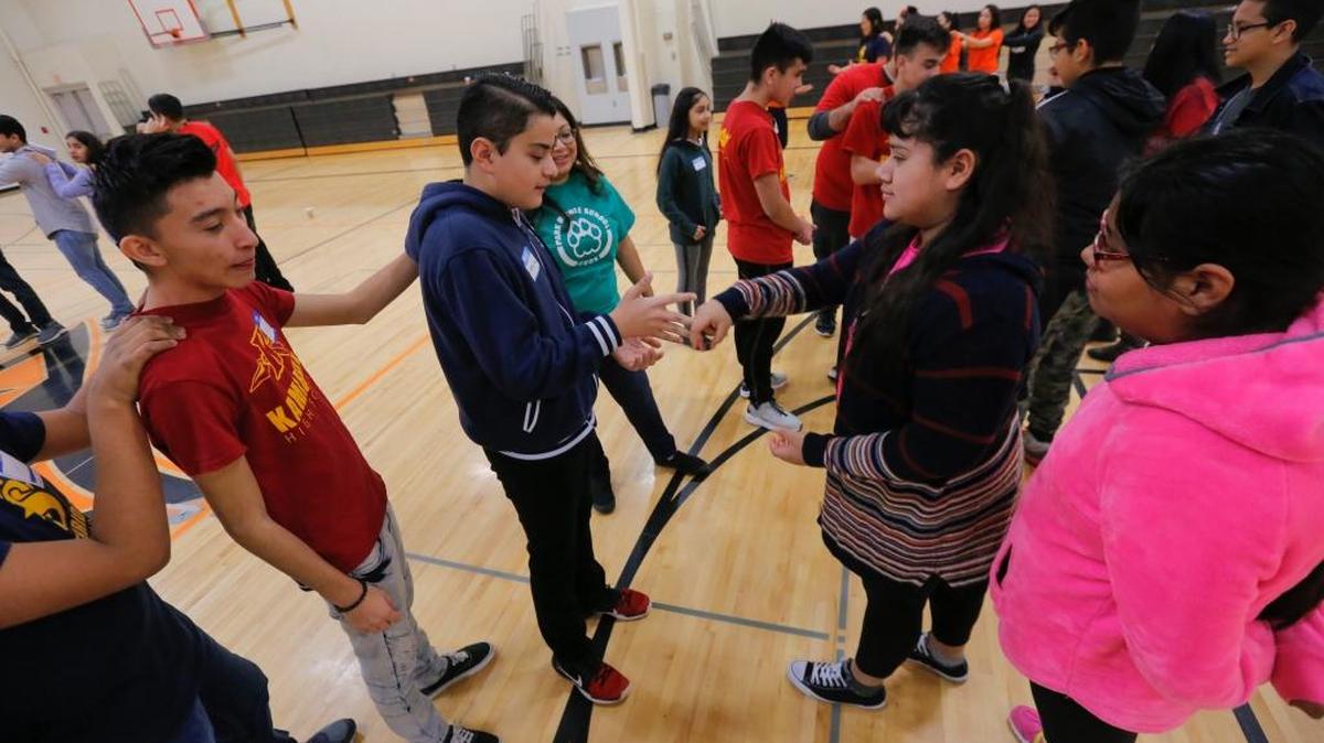 Students from Kamiakin, Kennewick and Southridge high schools participate in workshops for team building Saturday at Kennewick High School as their parents take part in other workshops during Sembrando Esperanza en Nuestra Comunidad (Planting Hope in Our Community). The educational event for parents emphasized internet safety for their children, supporting student’s academic success, and drug awareness and prevention. The event also provided breakfast and lunch for the families.