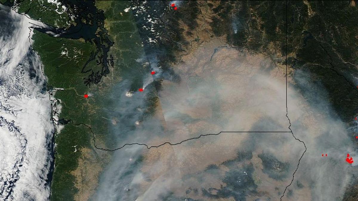 Smoke from Oregon and Idaho appears to roll over Southeastern Washington in this satellite photo from the Washington Department of Ecology.