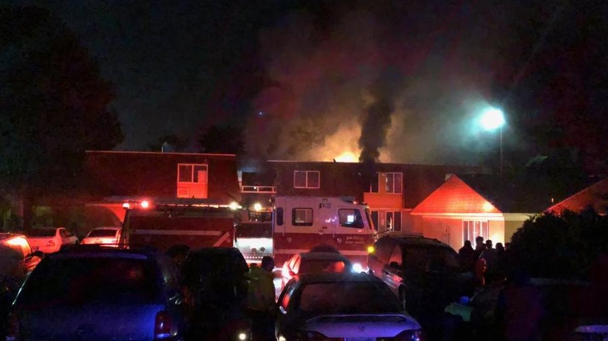 A fire tore through upstairs apartments at the Tri-Cities Vista Low-Cost Housing complex.