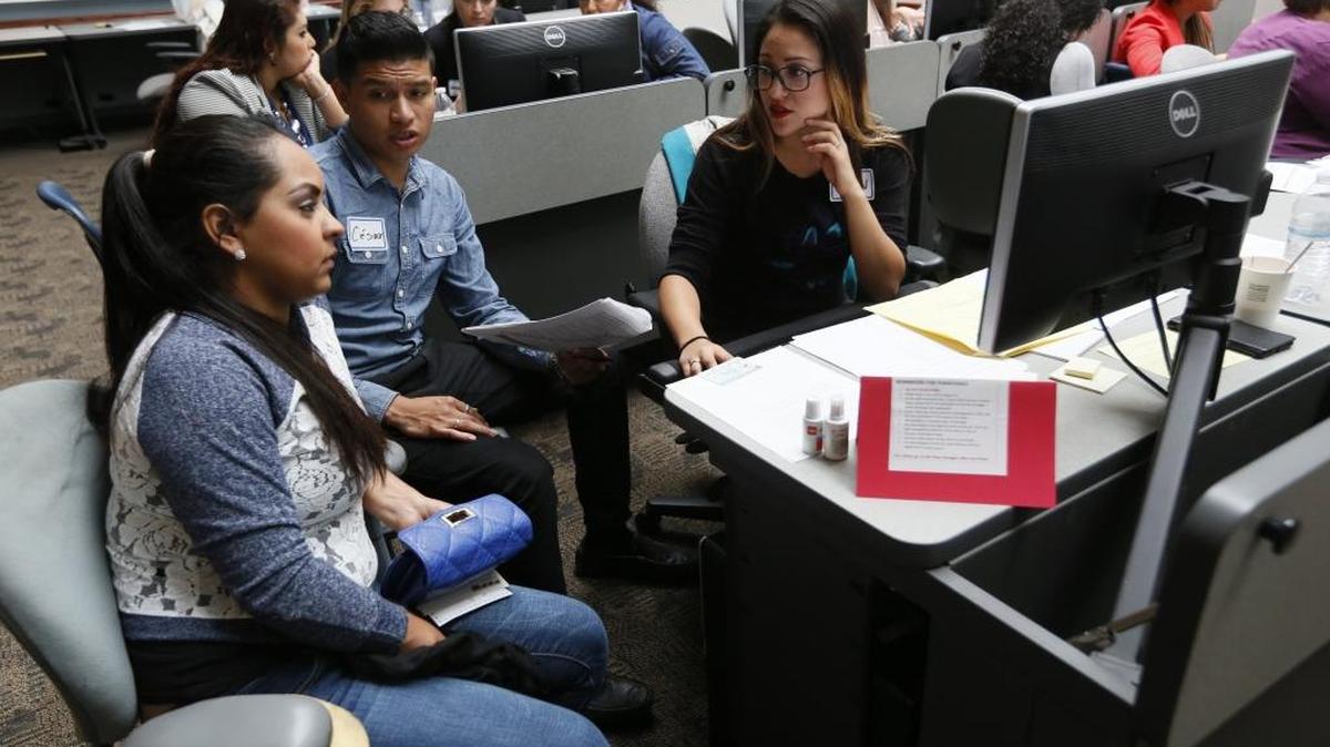 Legal permanent residents can get help filling out complex naturalization paperwork at a free legal clinic Sept. 23 in Pasco. The Washington New Americans has organized semi-annual Citizenship Day events, like the one pictured in 2014, at Columbia Basin College.