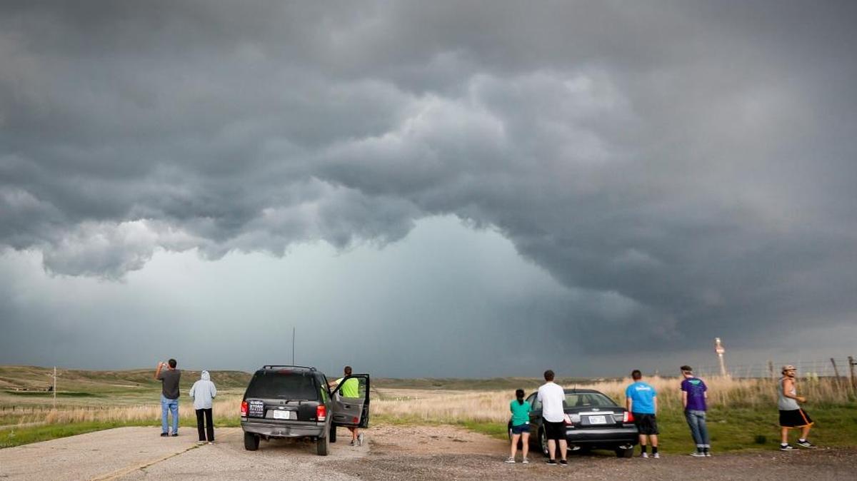Storms chasers watch a thunderstorm after a tornado watch was issued in Kansas. Jiwen Fan, a Pacific Northwest National Laboratory scientist, is studying why thunderstorms are becoming more severe in the center of the nation.