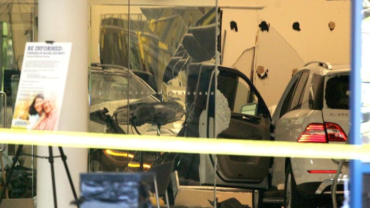
A vehicle sits inside a health club after a motorist crashed through the doors, in Livermore, Calif., on Tuesday, killing a former employee of Pacific Northwest National Laboratory in Richland.
