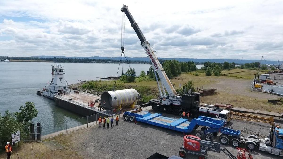 This 65-ton stainless steel vessel was barged up the Columbia River from Vancouver to Richland last summer. PNNL researchers are helping Bechtel National test the vessels that will receive, store and process radioactive sludge at the Waste Treatment and Immobilization Plant’s Pretreatment Facility before it is vitrified. The full-scale vessel is 35 feet high with a 16-foot diameter and 22,000-gallon capacity.