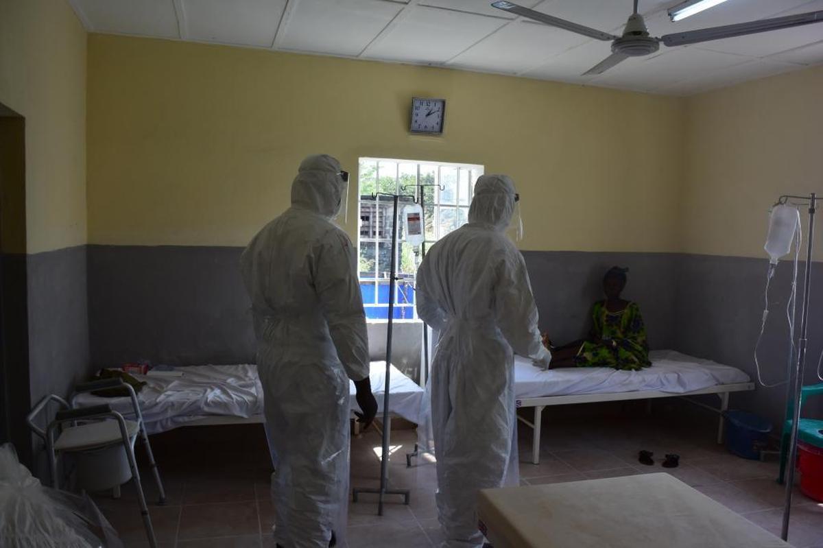 Health workers tend to a patient at one of Sierra Leone’s military hospitals.
