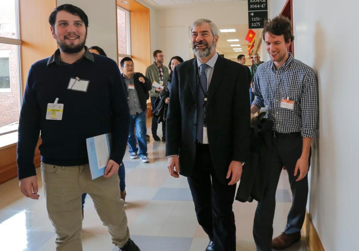 University of Washington’s student Alex Bard, left, and researcher Matthew Crane, right, walk with Jim De Yoreo, center, co-director of Northwest Institute for Materials Physics, Chemistry and Technology (NW Impact), as they tour Pacific Northwest National Laboratory in Richland. UW and PNNL launched a joint project focused on materials science.