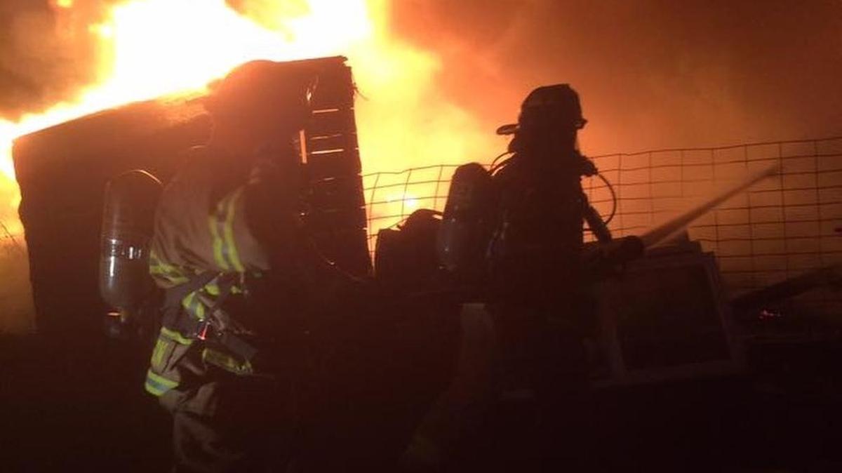A 30-foot RV trailer parked between Grandview and Prosser burned on Saturday night. The man living inside escaped but lost his home.