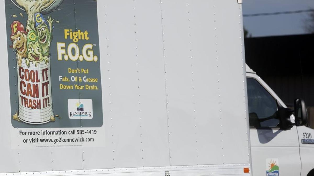 A Kennewick Fats Oils and Grease truck is parked on the street after cleaning out FOG systems on South Vancouver Street in Kennewick. As of March 1, 36 of Kennewick’s 279 food service operators have failed to fully comply with the 2012 Kennewick Pretreatment Act.
