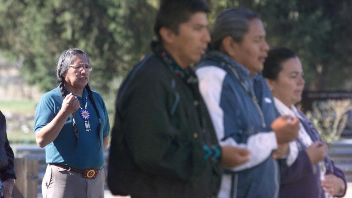 Albert Andrews-Redstar, left, a tribal member from the Colville Confederate Tribes, joins other tribal members from the Northwest in a traditional prayer at the start of a ceremony in Columbia Park in September 2000. The event was held in response to the Interior Department’s decision to return the Kennewick Man skeleton to the Northwest American Indian tribes.