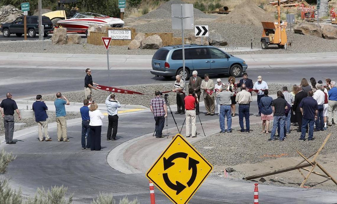 June 14, 2016 - State and local officials gather Monday to celebrate the opening of the $4.5 million roundabout in Benton City. It is at the intersection of highways 224 and 225 an was the first phase of a project that would have added a new Interstate 82 interchange at Red Mountain.