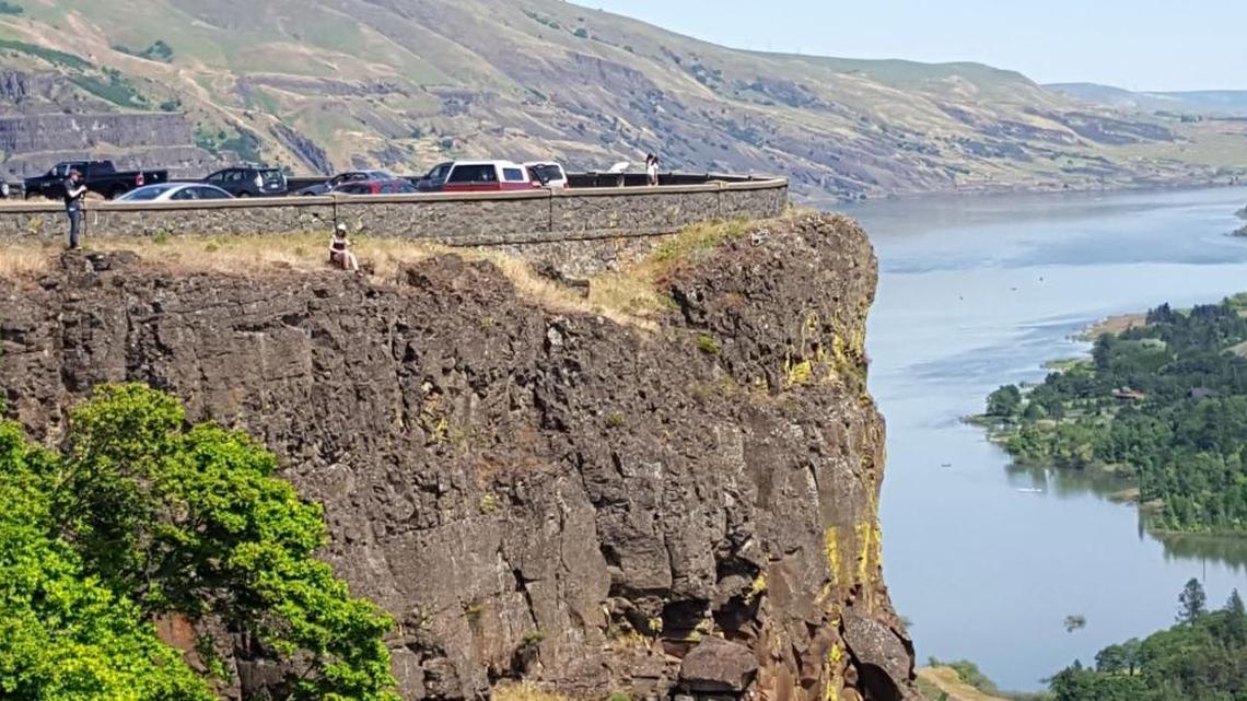 Don’t get too close to rocky edges when enjoying the outdoors. This couple climbed outside the parking lot barrier to take photos at the Tom McCall Point Trail in the Columbia River Gorge.