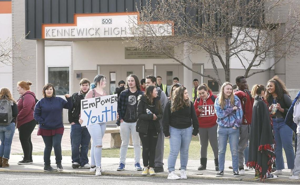 A group of about 40 Kennewick High students gathered last month in front of the school on Dayton Street to show their support for school shooting victims in Florida.
