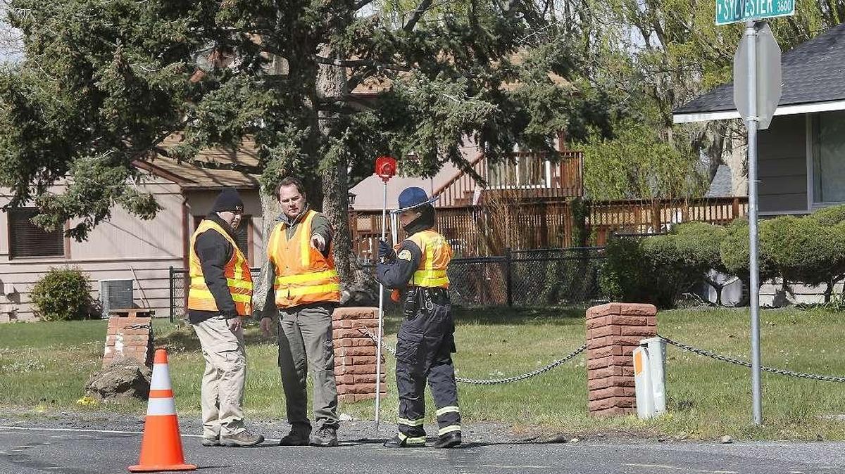 Washington State Patrol investigators study the scene of the April 2 fatal crash at West Sylvester Street and Road 36 in Pasco. Proposed legislation would put sentences for vehicular homicide in a reckless manner in the same range as for first-degree manslaughter.