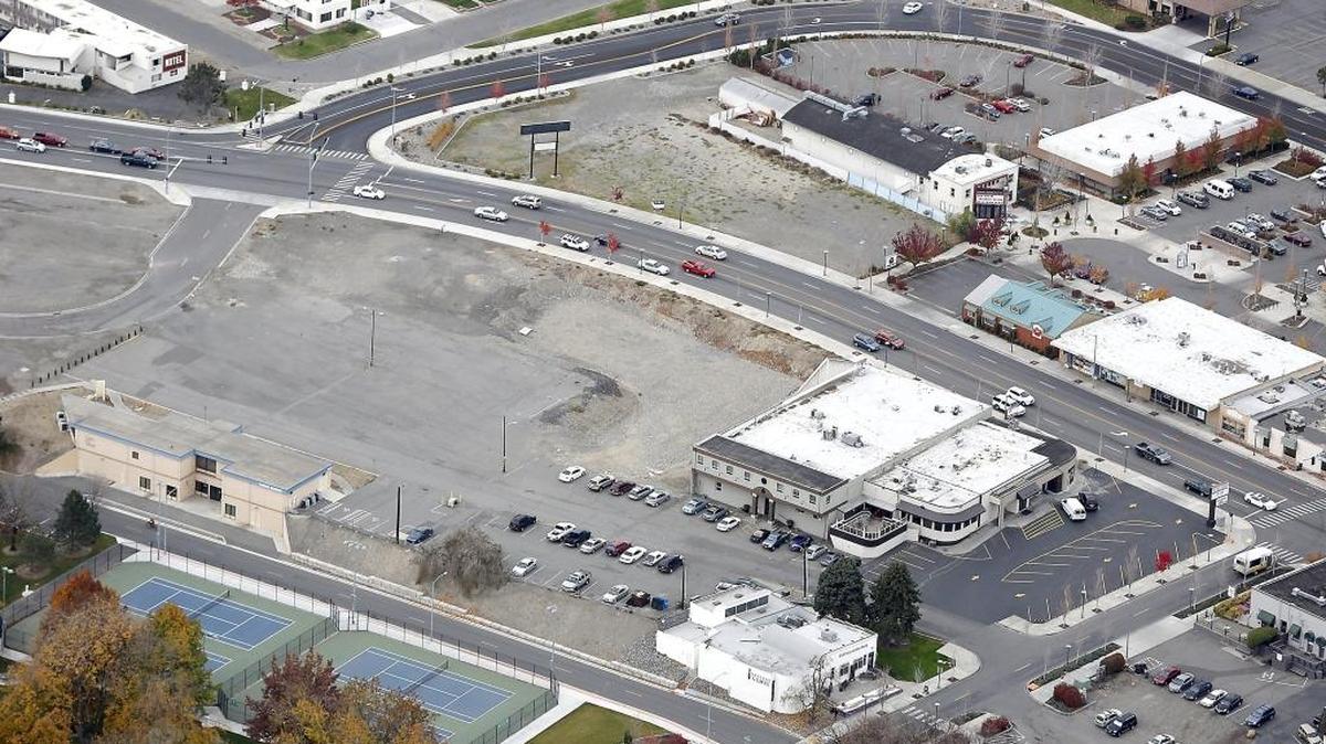 A proposal to build a public market or strip mall on the L-shaped pit fronting George Washington Way, center, has increased concerns about the amount of parking — and what it could look like — in the areas near Howard Amon Park and The Parkway, upper right.