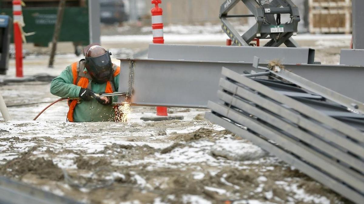 A construction worker from Evergreen Erectors Inc. of Lynnwood uses a gas cutting torch Tuesday to trim a steel support beam for the roof of the office area of the new Pasco Police Community Services Building. The new $7.1 million building is on the east side of City Hall at 525 N. Third Ave. in Pasco. The project is being paid for with money from the voter-approved public safety sales tax in 2011. Total Site Services in Richland is the general contractor for the 38,000-square-foot building, which expected to be completed by the middle of the year.