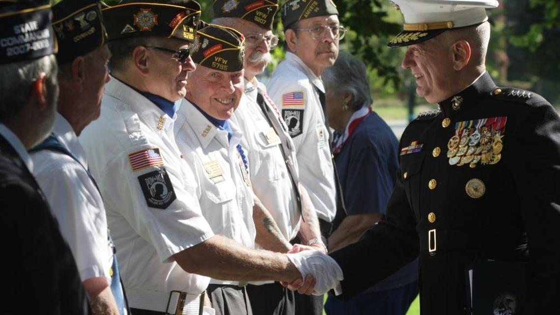 In this 2012 photo, Gen. James Mattis, commander of the U.S. Central Command in Tampa, Fla., greets veterans prior to the Time of Remembrance ceremony at Flat Top Park in West Richland.