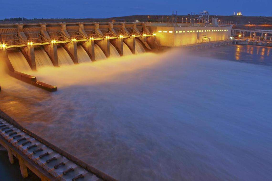 Ice Harbor Dam on the Snake River near Burbank is shown lighted at night.