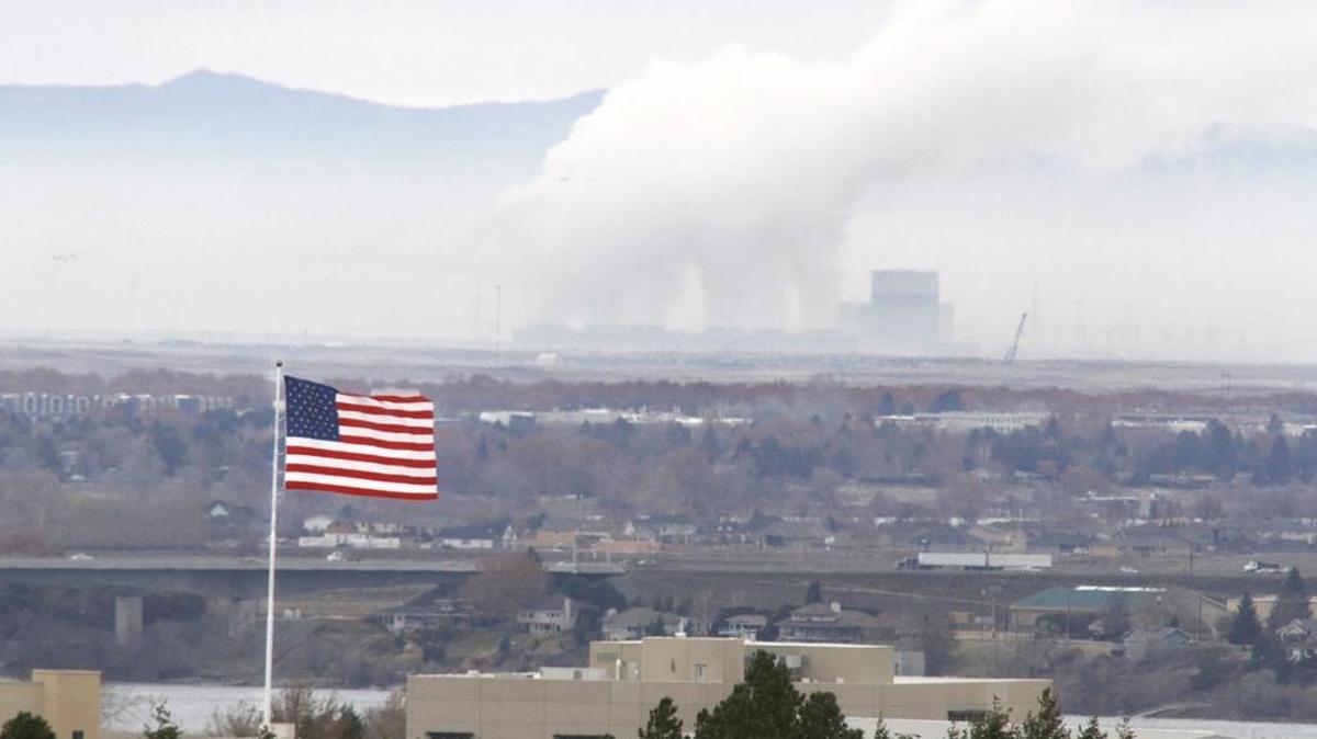 Windy conditions blow the steam around from the cooling towers at Energy Northwest’s Columbia Generating Station, the Northwest’s only nuclear energy facility, on the Hanford Nuclear Reservation in 2015.