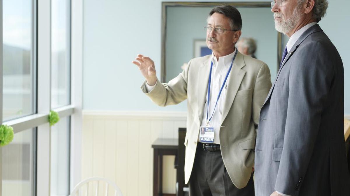 U.S. Rep. Dan Newhouse, right, talks Lane Savitch, president of Kadlec Regional Medical Center, during a tour of the pediatric floor at Kadlec in Richland. Newhouse in 2016.