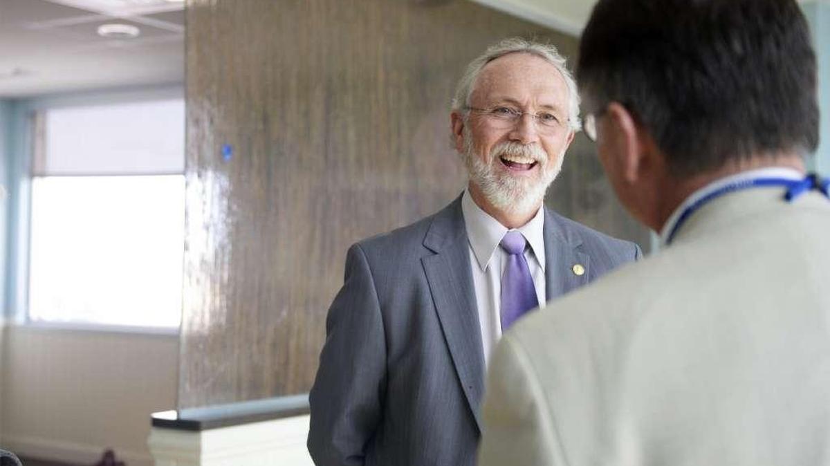 U.S. Rep. Dan Newhouse talks with an official at Kadlec Regional Medical Center in Richland during a tour of the hospital’s pediatrics floor.