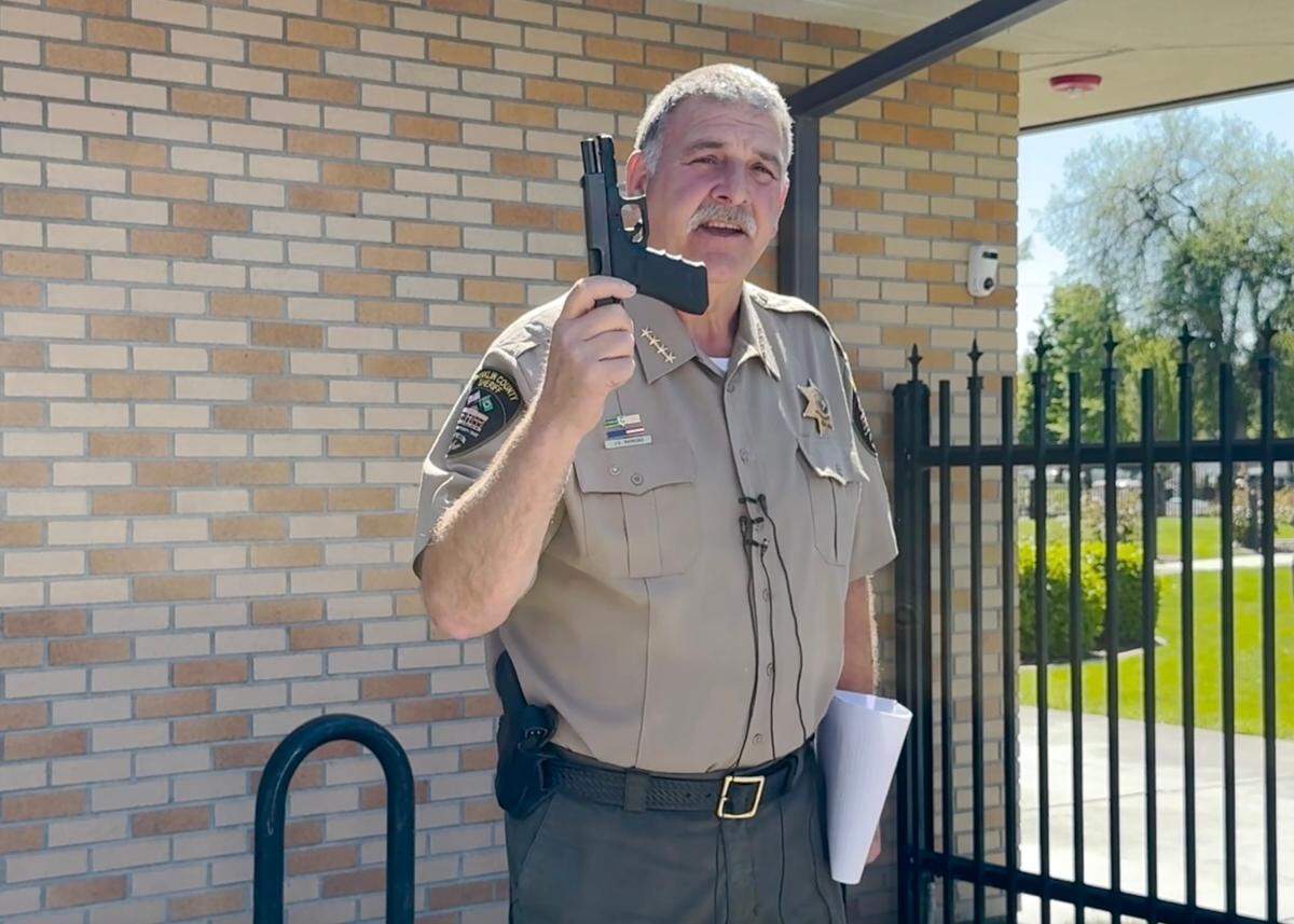 Franklin County Sheriff Jim Raymond has questioned whether the new county corrections department has the legal authority to allow corrections officers to carry weapons, including guns. He seized 50 guns from the jail on Monday.